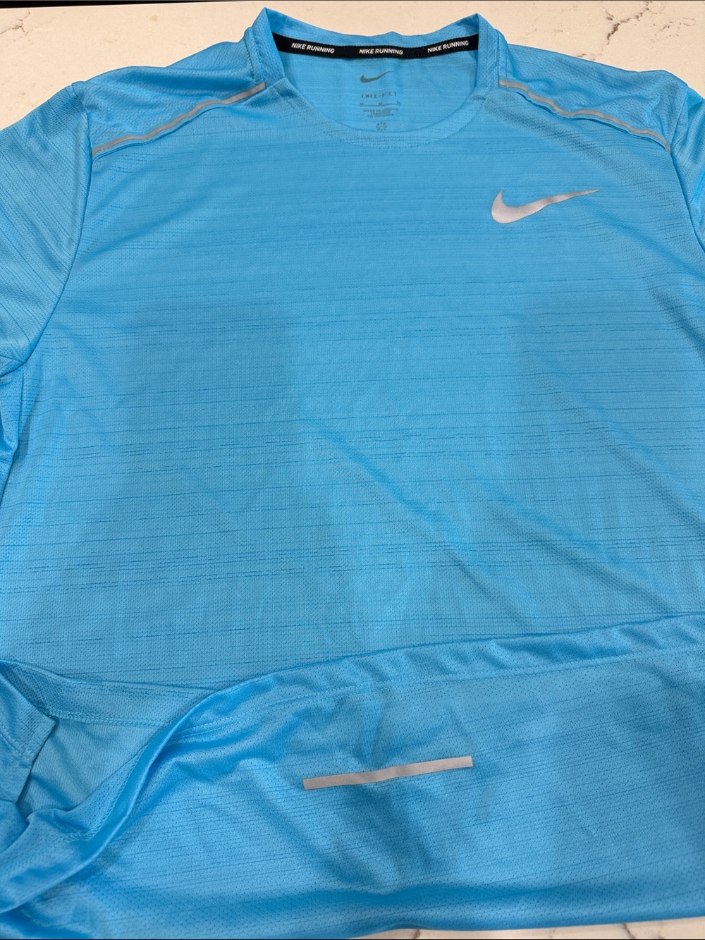 Nike Light Blue Dri-FIT Running Tee with Silver Swoosh